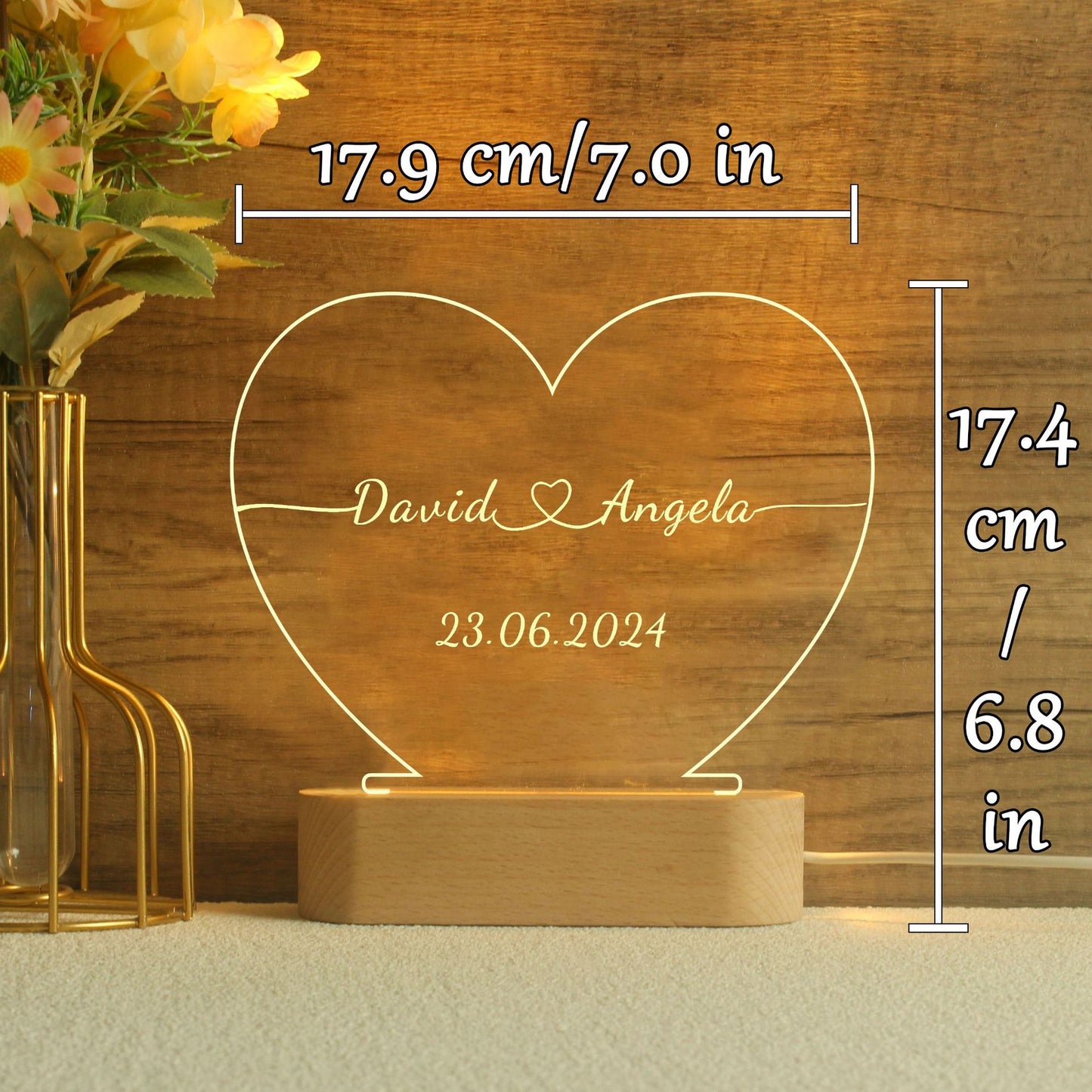 Custom engraved acrylic heart night light with couple names and date glowing warm led