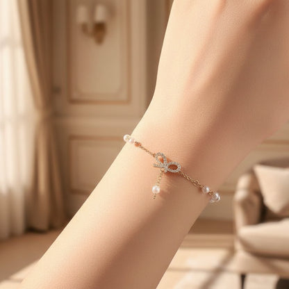 Pearl bow bracelet dainty ribbon design elegant gift