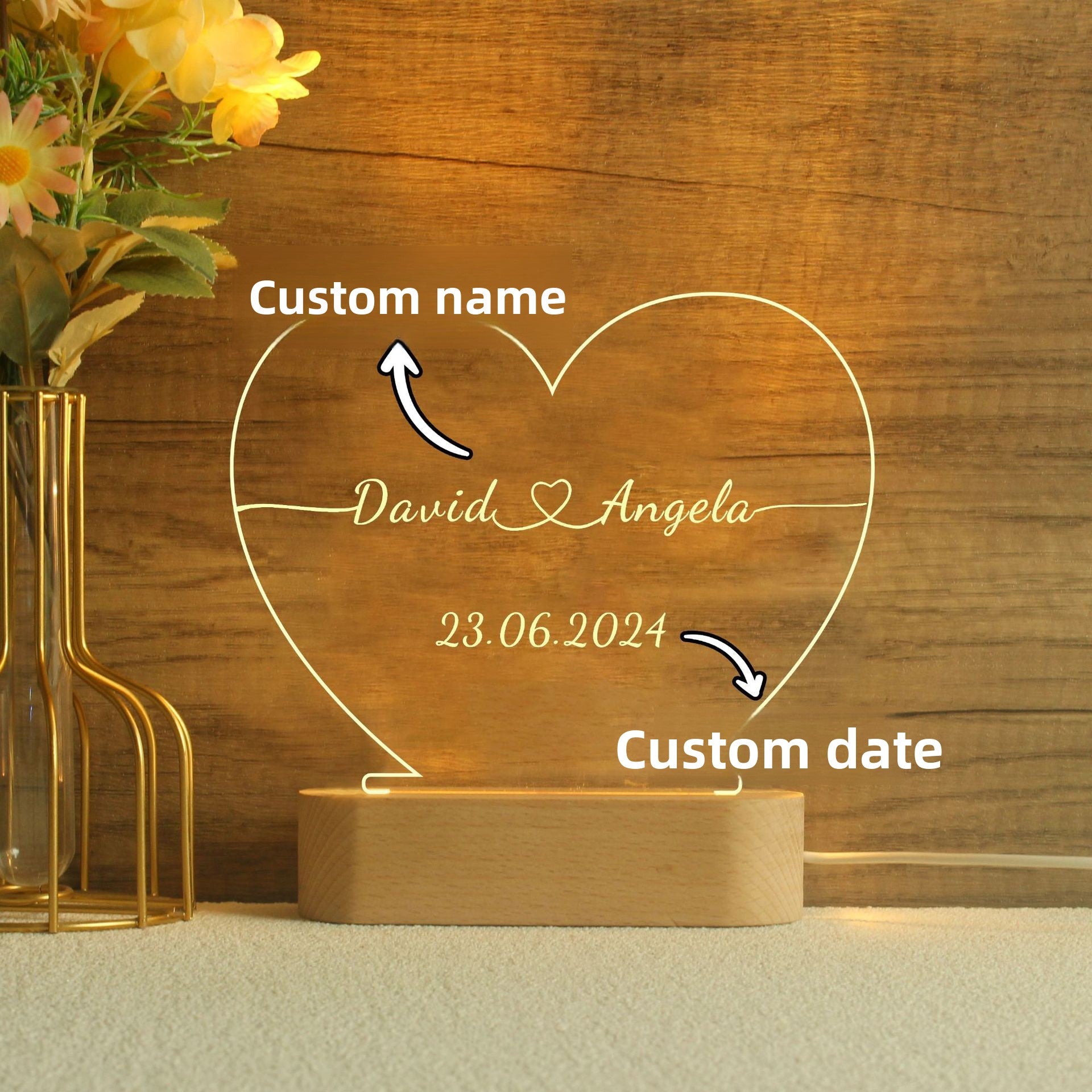 Custom engraved acrylic heart night light with couple names and date glowing warm led