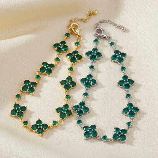 Multi-charm clover link bracelet gold luck symbol for women