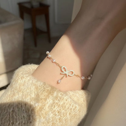 Pearl bow bracelet dainty ribbon design elegant gift